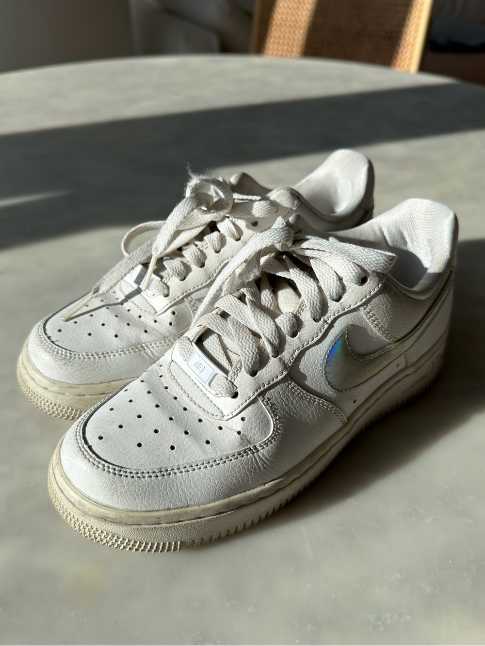 Nike White Low-Top Sneakers with Iridescent Swoosh
